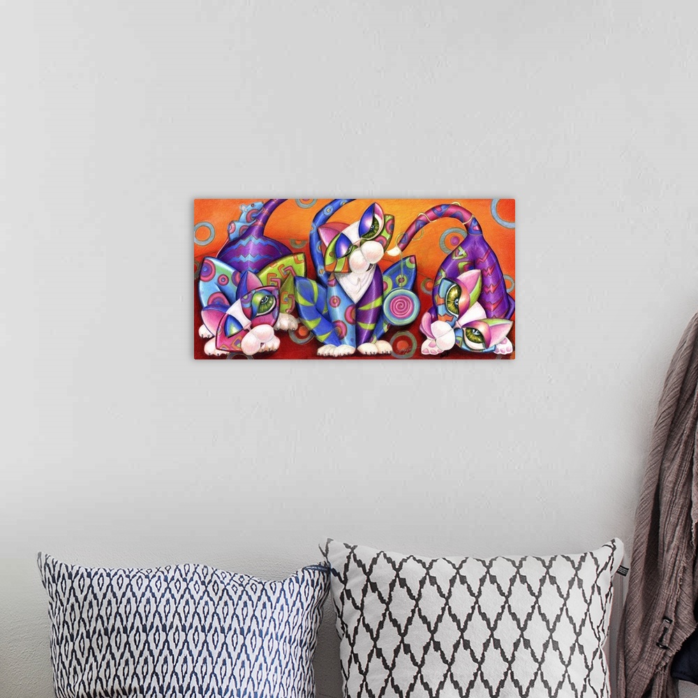 A bohemian room featuring Contemporary artwork in the style of cubism of three cats in bold colors.