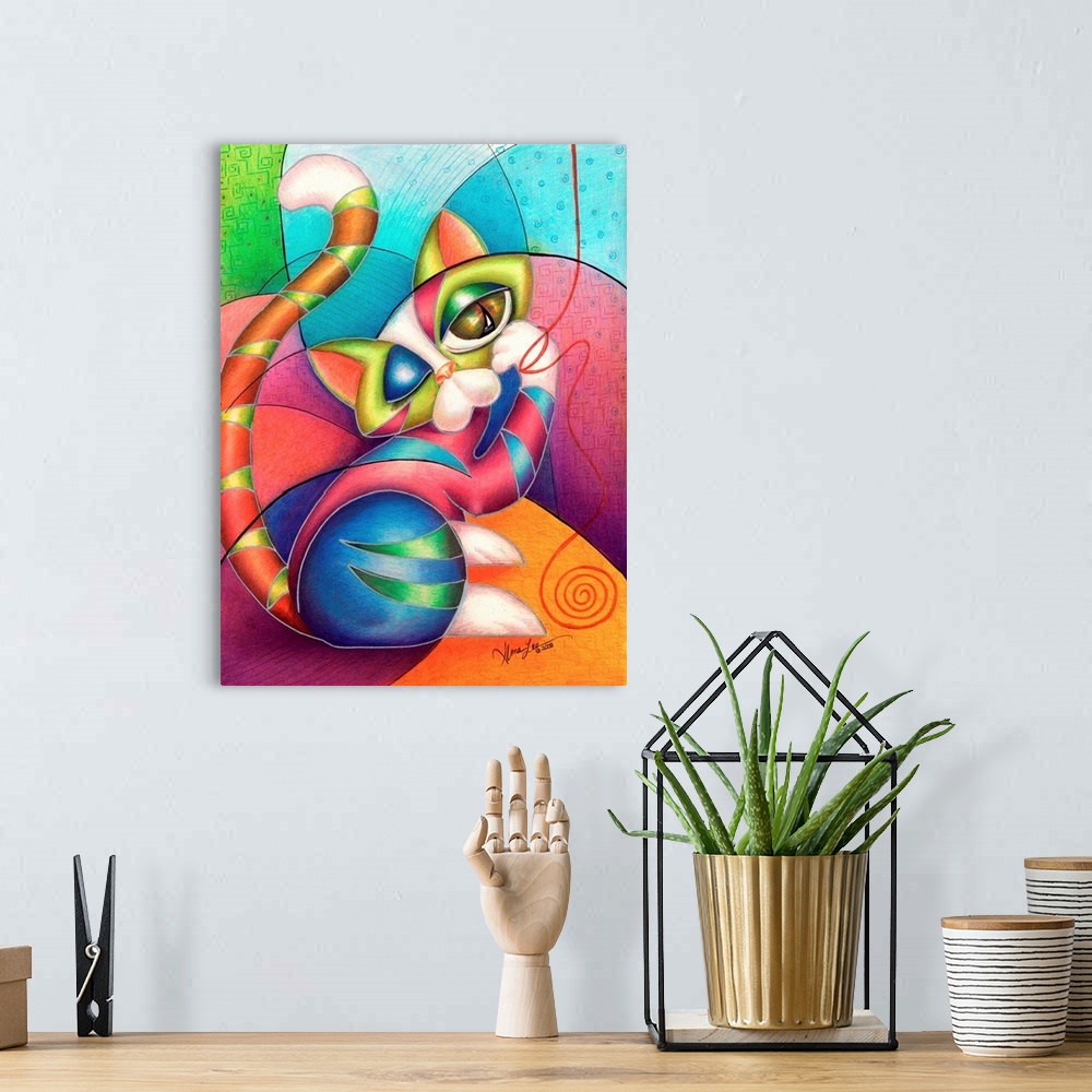 A bohemian room featuring Contemporary artwork in the style of cubism of a cat with yarn in bold colors.