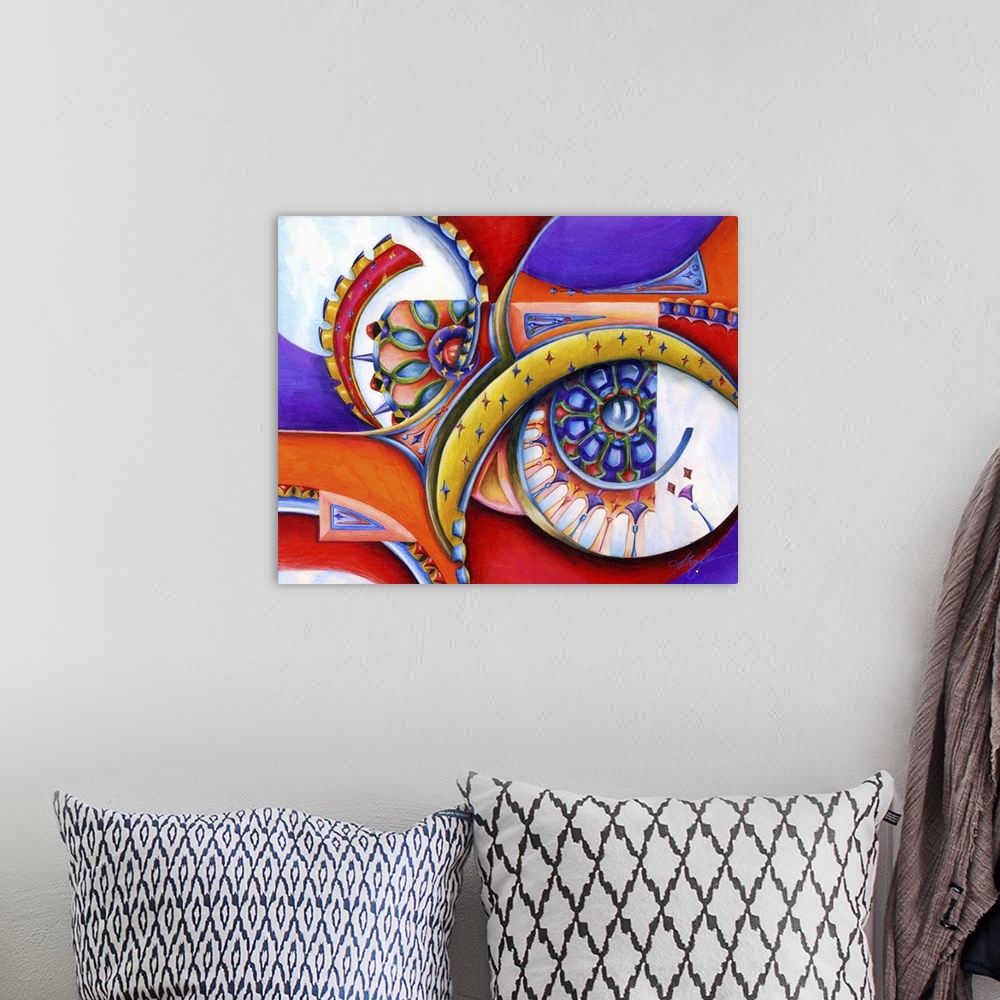 A bohemian room featuring Horizontal abstract painting of vibrant colored shapes of circles and triangles.