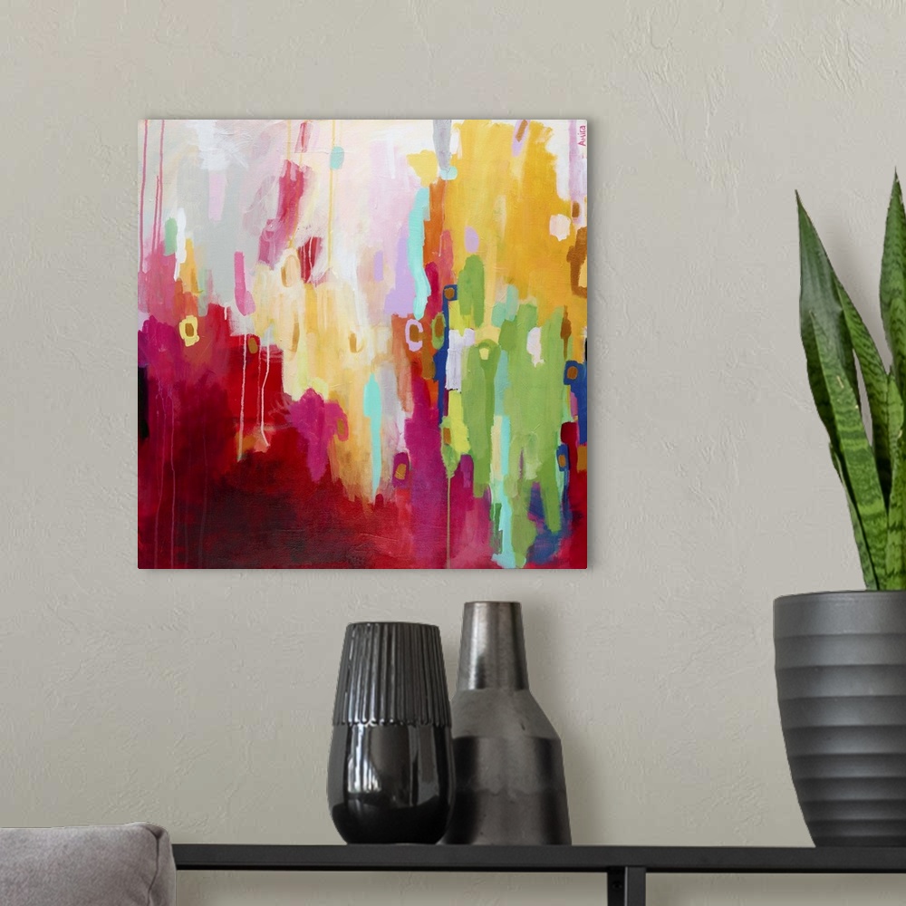 A modern room featuring Contemporary abstract painting in shades of deep red, green, and yellow.