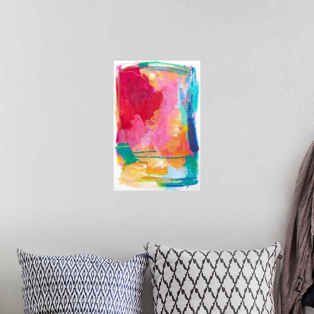 A bohemian room featuring Contemporary abstract artwork in bright red, pink, and teal shades.