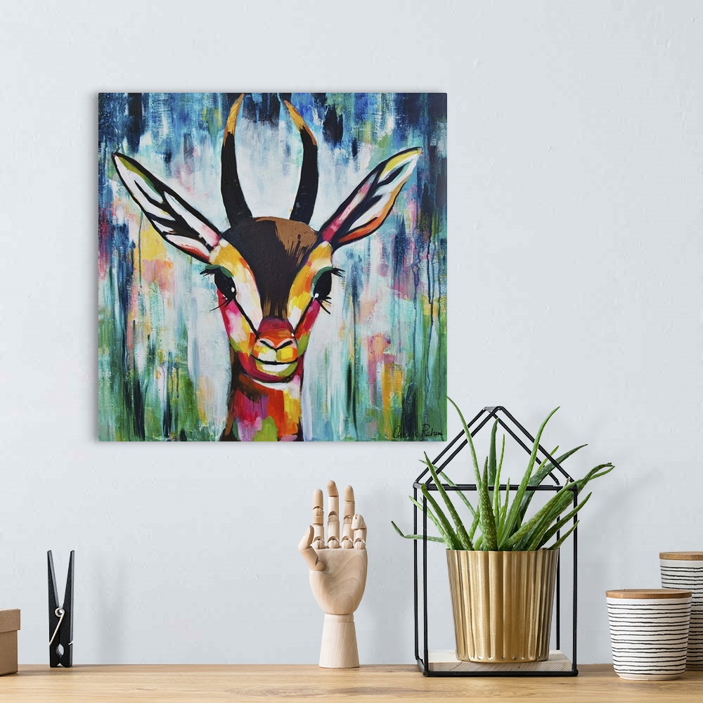 A bohemian room featuring Colorful portrait of a gazelle with long ears.