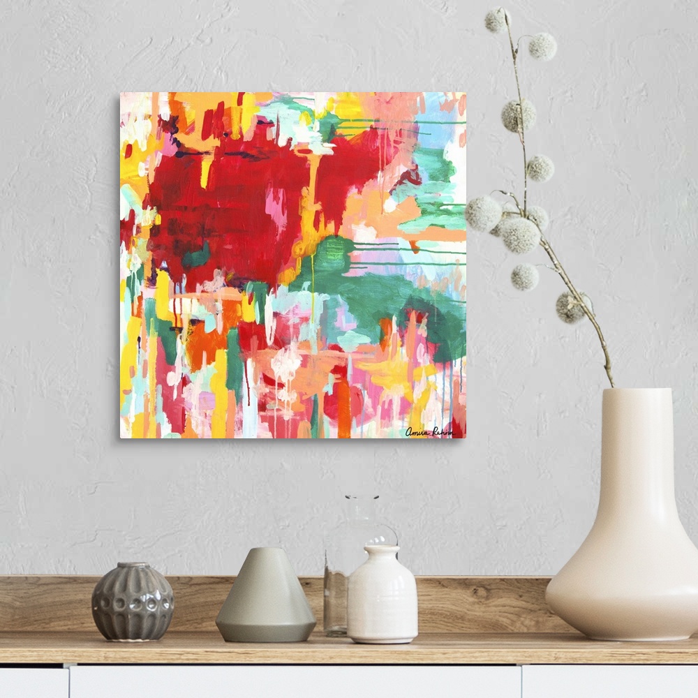 A farmhouse room featuring Contemporary abstract artwork in red, yellow, and green tones.