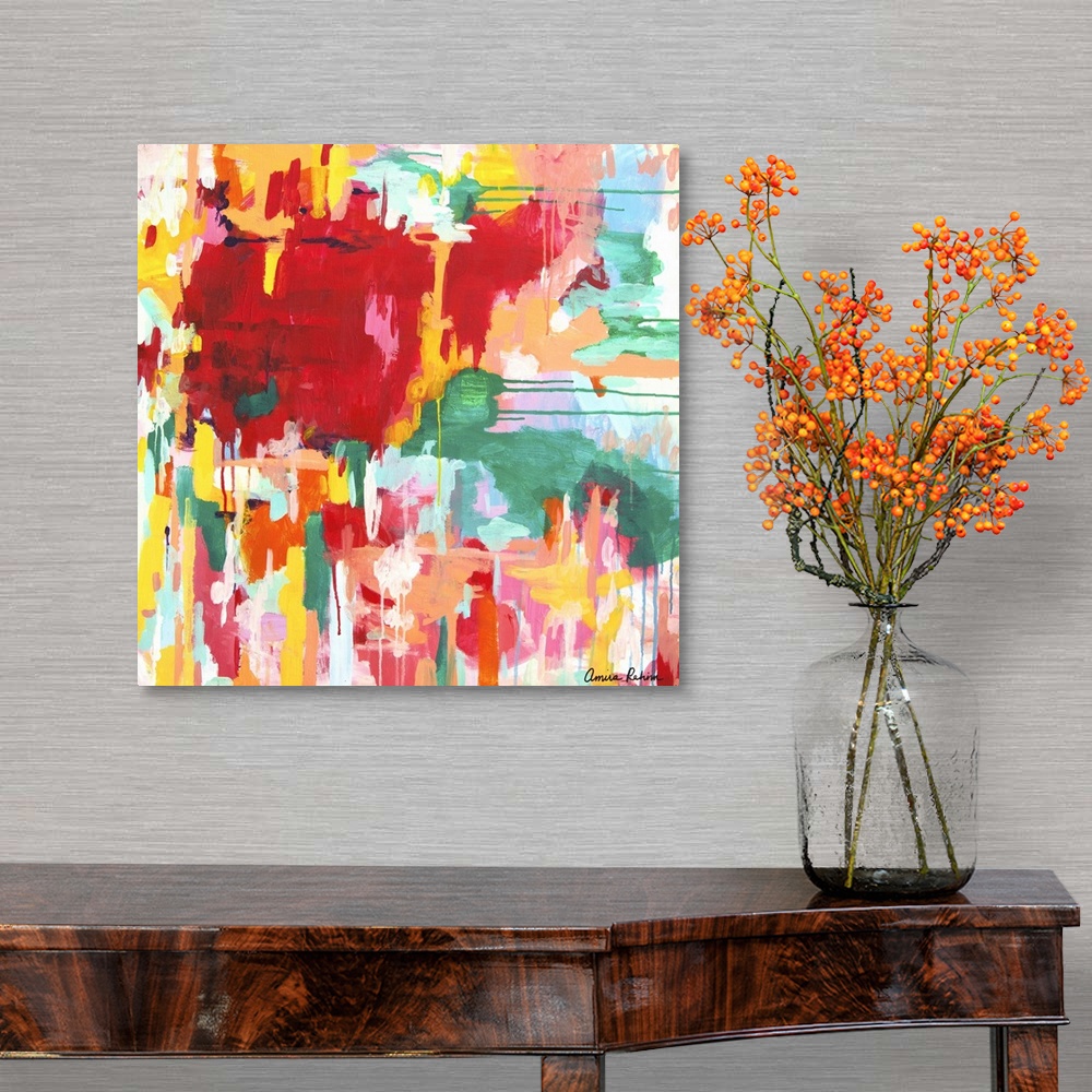 A traditional room featuring Contemporary abstract artwork in red, yellow, and green tones.