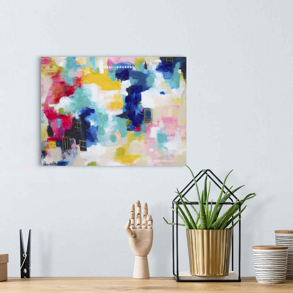 A bohemian room featuring Brightly colored abstract mixed media artwork.