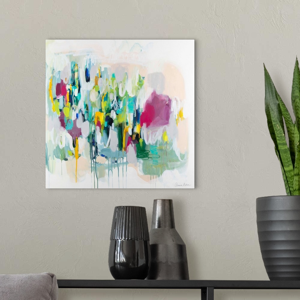 A modern room featuring Abstract mixed media artwork in bright greens and blues with a bit of pink on a white background.