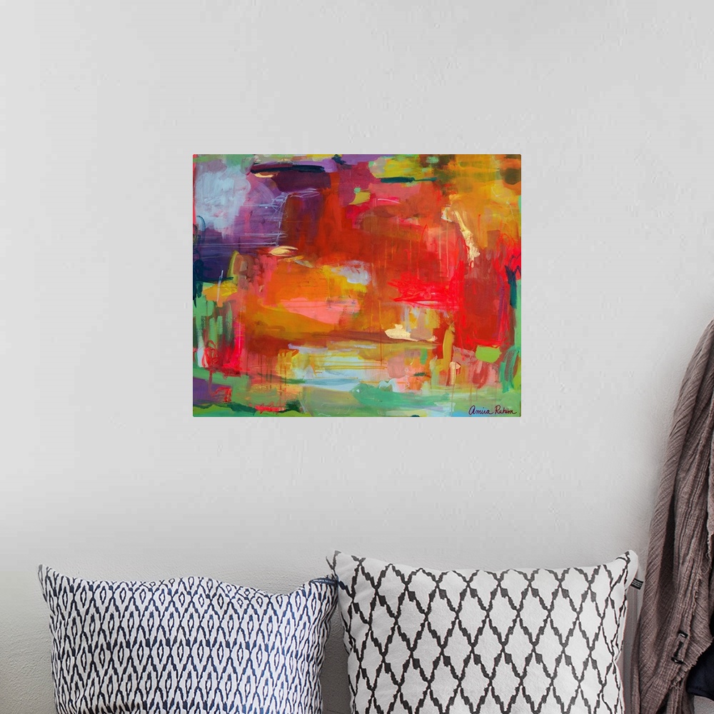 A bohemian room featuring Contemporary mixed media abstract artwork in vibrant red, green, and purple.
