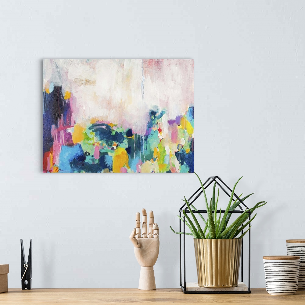 A bohemian room featuring Contemporary abstract painting with pink, yellow, and teal against white.