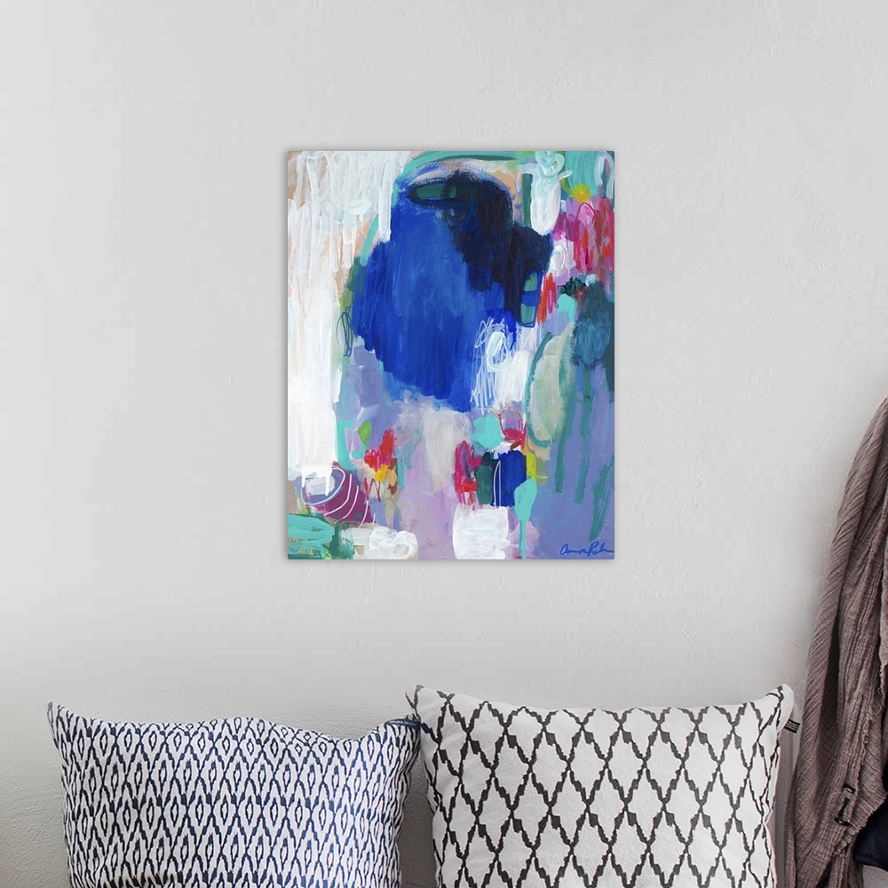 A bohemian room featuring Contemporary abstract art with deep blue tones and lighter turquoise and white.