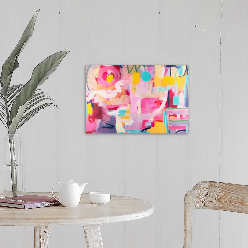 A farmhouse room featuring Contemporary artwork in pink, yellow, and turquoise.