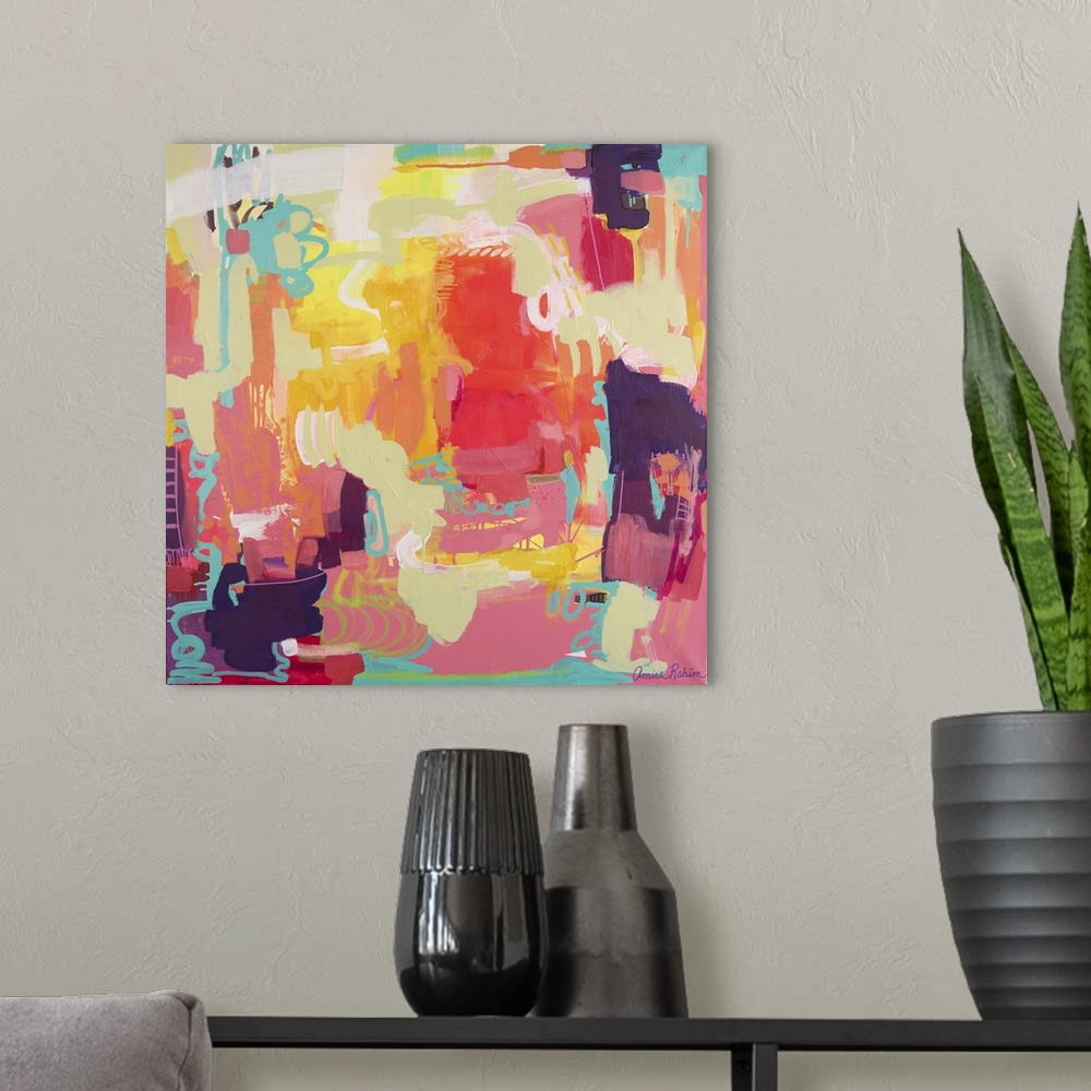 A modern room featuring Mixed media abstract painting in tropical red, yellow, and teal tones.