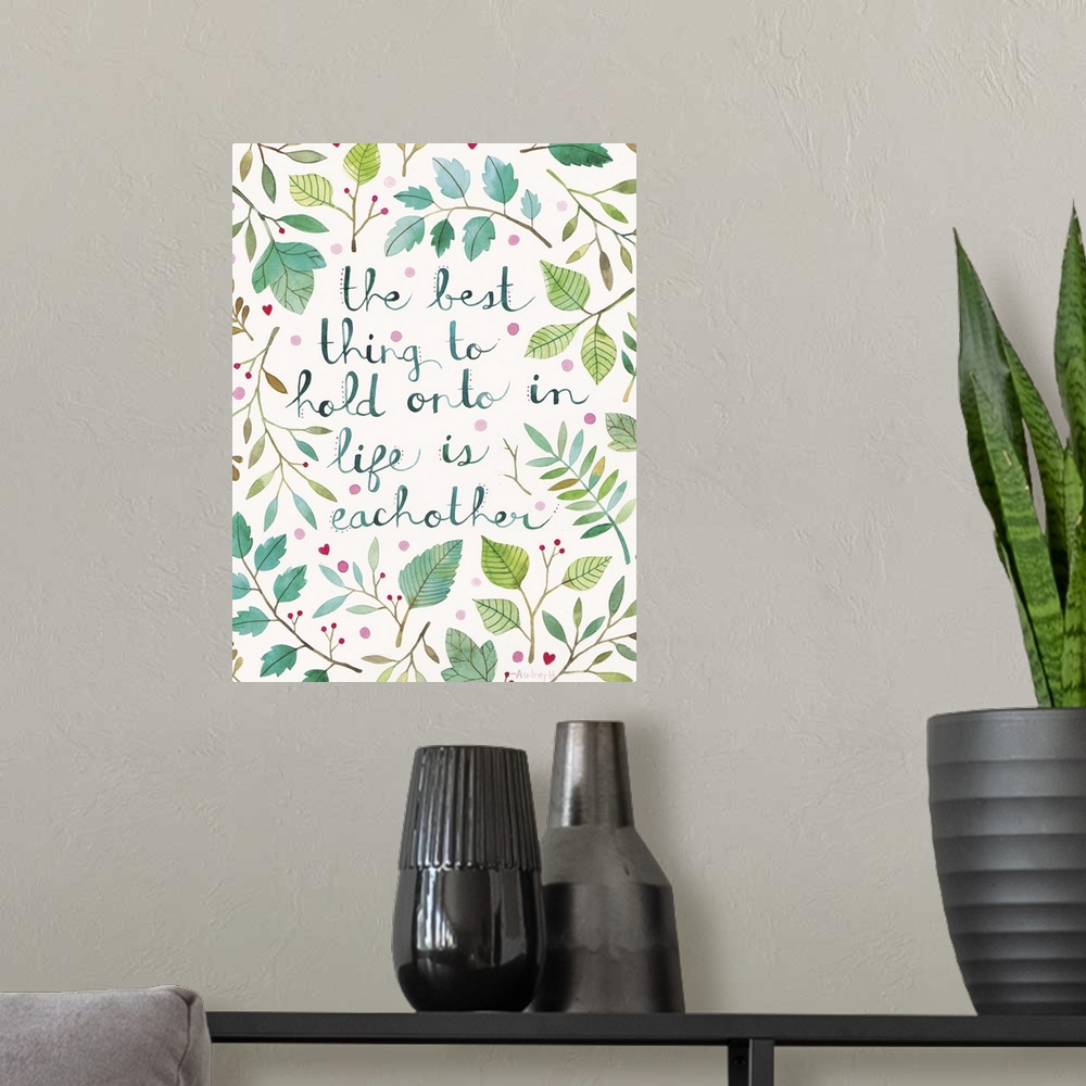 A modern room featuring Contemporary painting of hand-lettered text surrounded by delicate leaves.