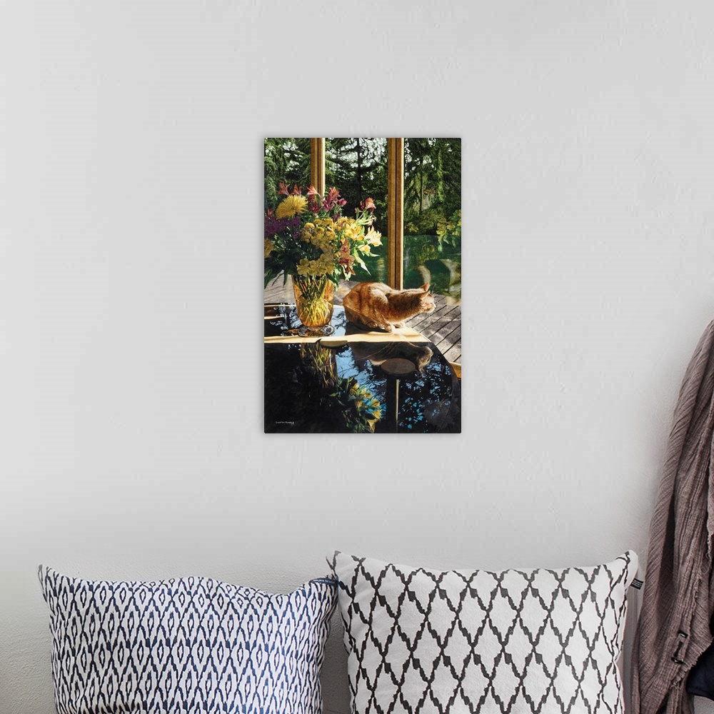 A bohemian room featuring A vertical image of a yellow tabby cat sitting on a table next to a vase of flowers will looking ...