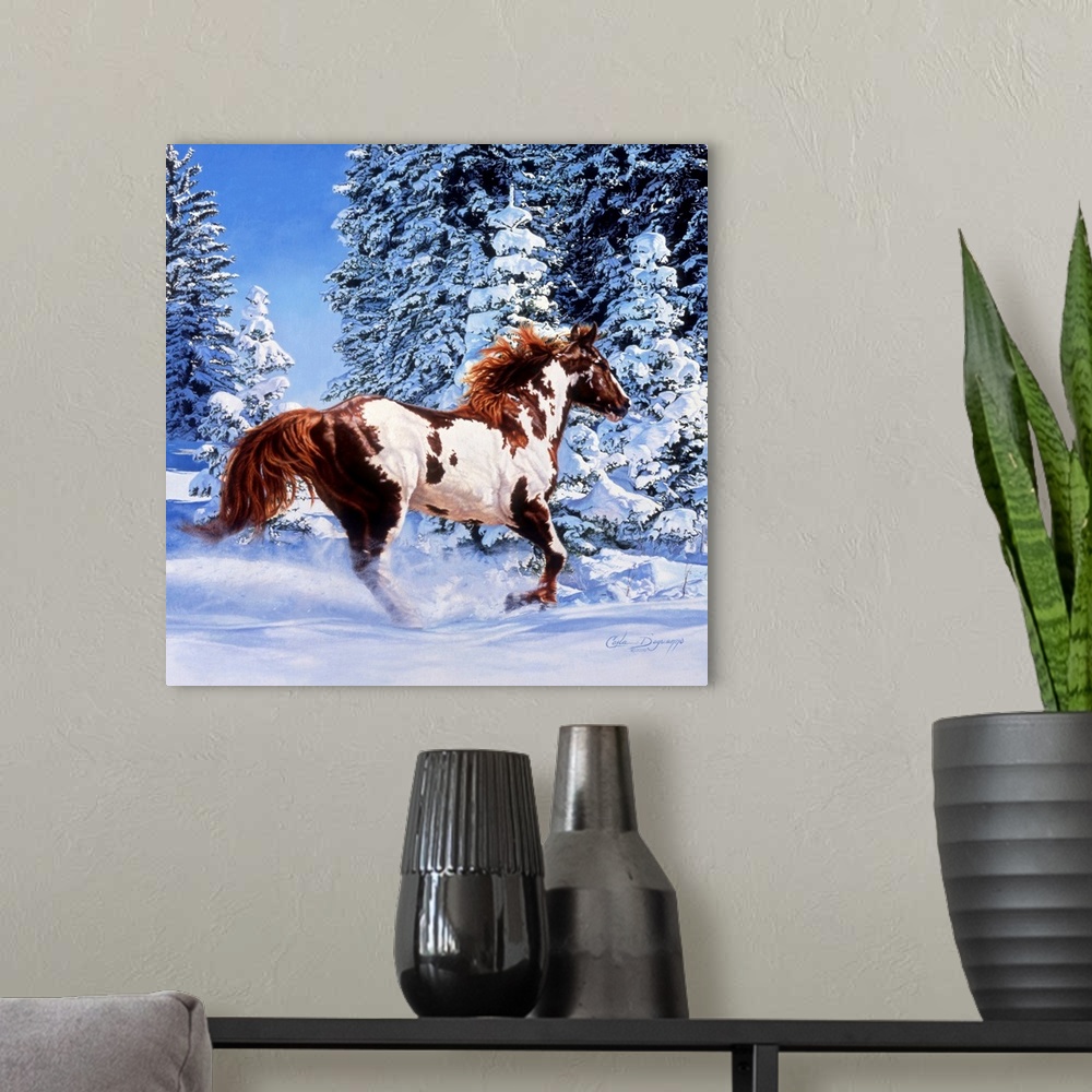 A modern room featuring Square, large wall picture of a brown and white horse kicking up snow as he runs through a winter...