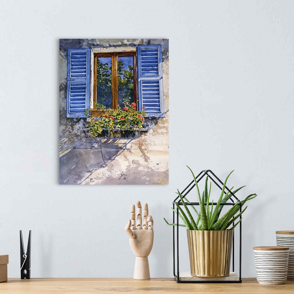 A bohemian room featuring Window with Blue Shutters