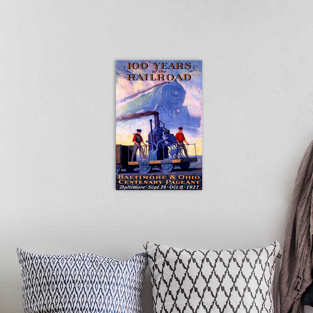 A bohemian room featuring Old print advertising anniversary of the locomotive industry.  There is an image of a train and a...