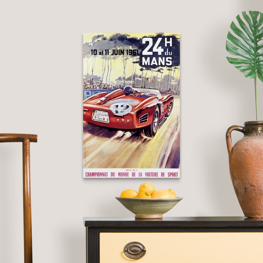 A traditional room featuring Giant antique advertising art for a car racing world championship showcases an automobile driving...