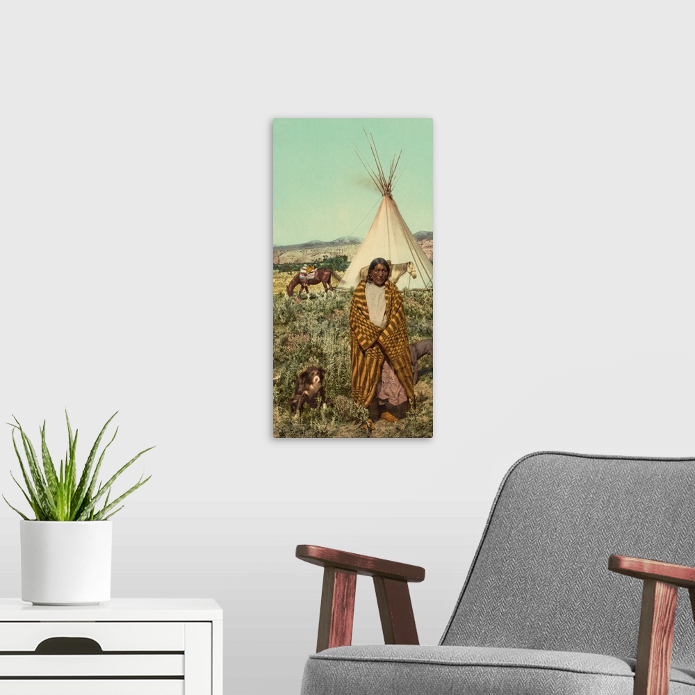 A modern room featuring Hand colored photograph of a crow native American.