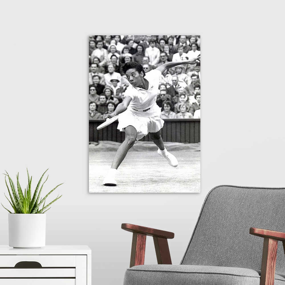 A modern room featuring UNDATED:  Althea Gibson of the United States plays during Wimbledon in 1956  Gibson, the first bl...