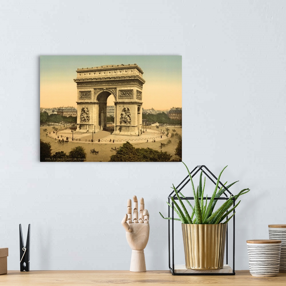 A bohemian room featuring Hand colored photograph of arc de triomphe, de l'etoile, Paris, France.