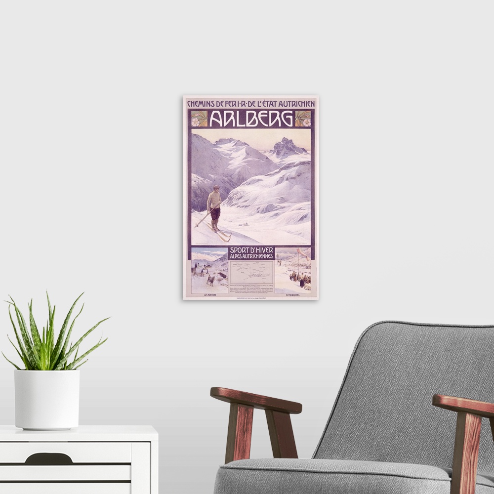 A modern room featuring A vintage poster of a single skier standing on a hill looking out onto the snow covered mountains.