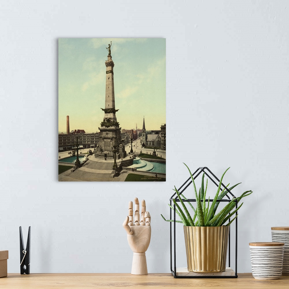 A bohemian room featuring Hand colored photograph of army and navy monument, Indianapolis, Indiana.