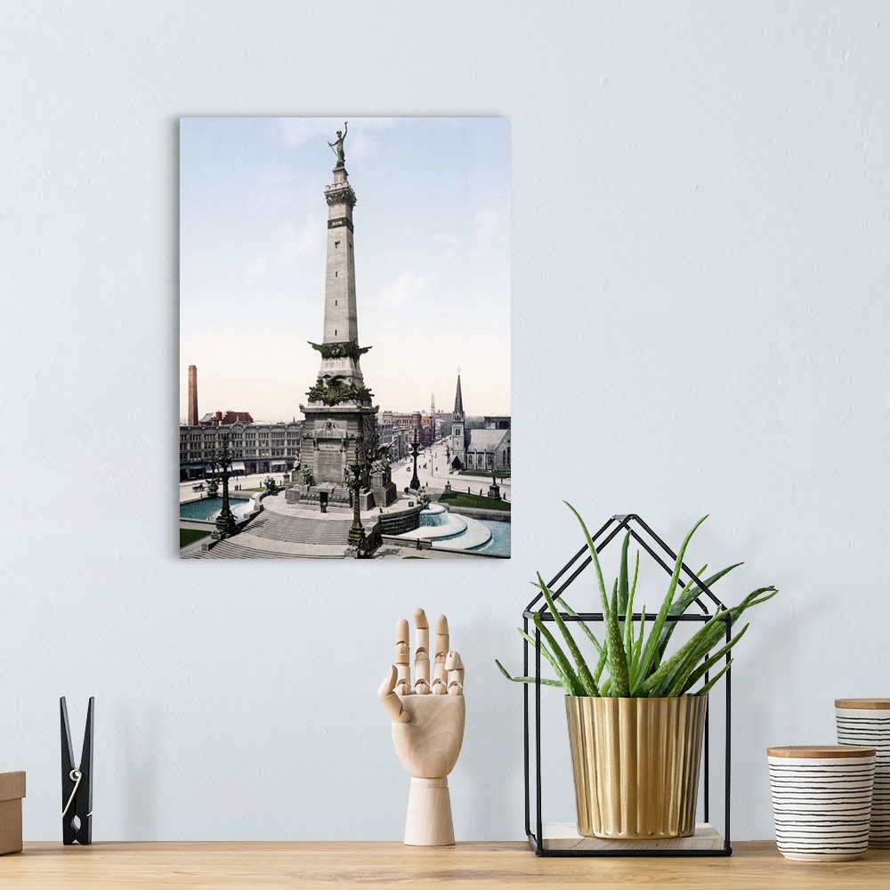 A bohemian room featuring Photograph of governmental monument surrounded by buildings.