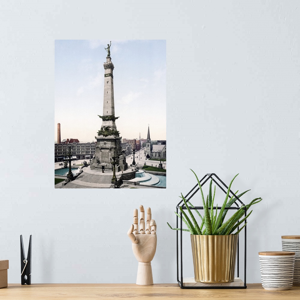 A bohemian room featuring Photograph of governmental monument surrounded by buildings.