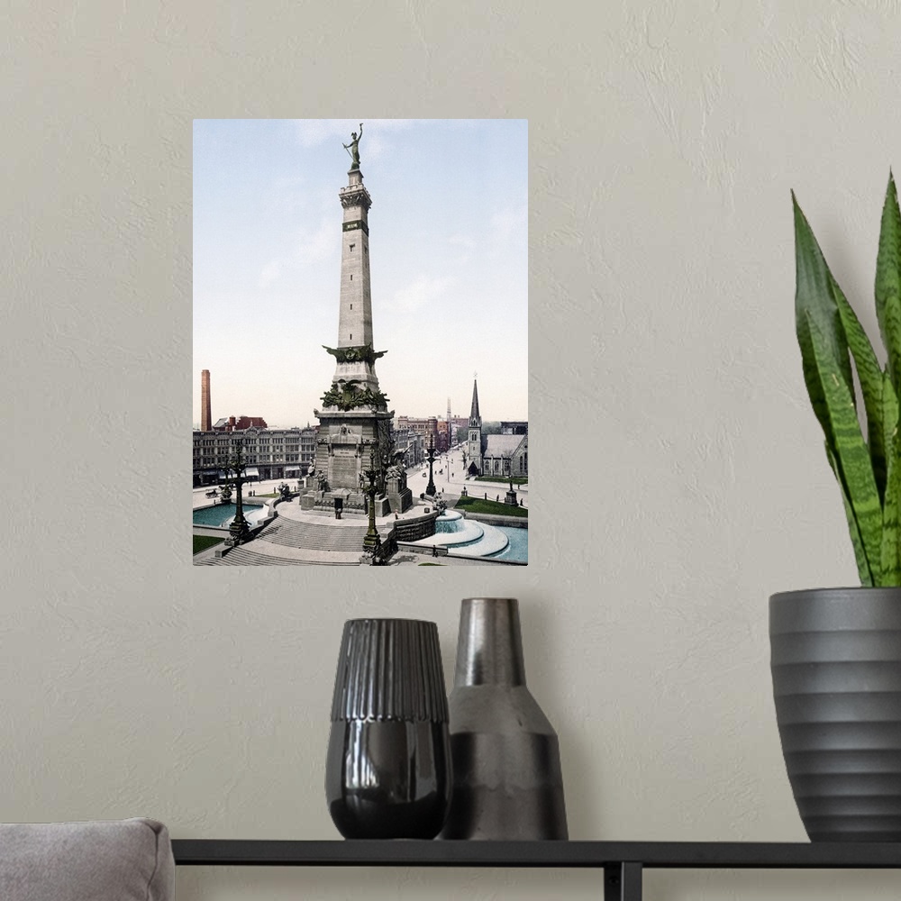 A modern room featuring Photograph of governmental monument surrounded by buildings.