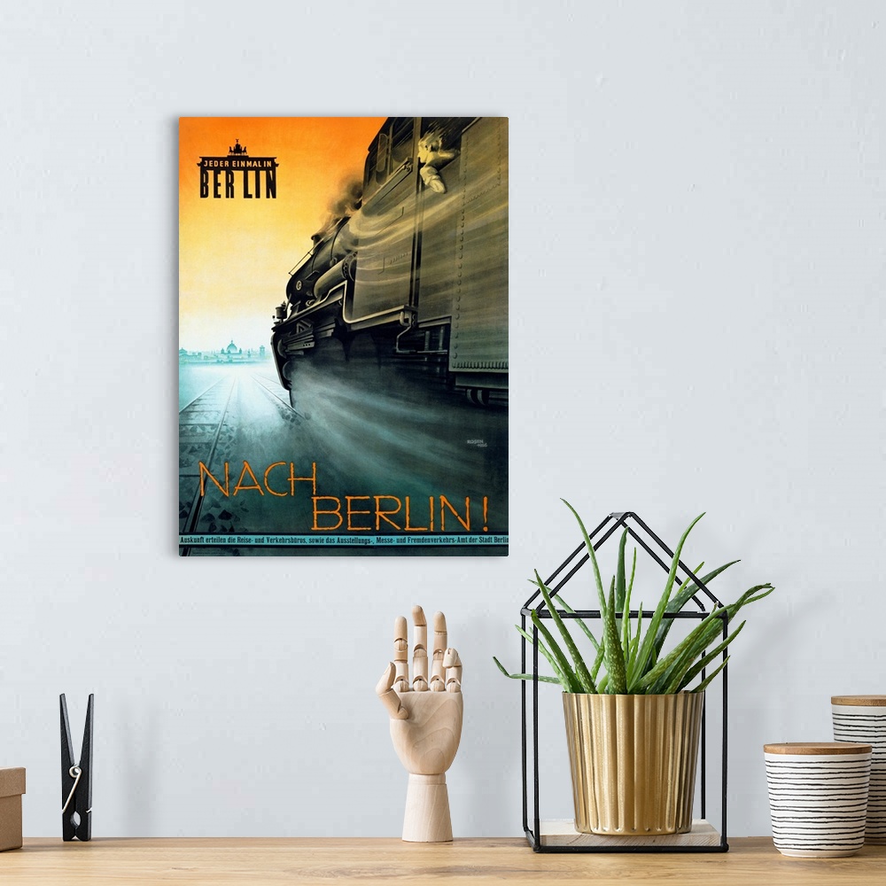 A bohemian room featuring Vintage Nach Berlin poster with a speeding passenger train passing by towards the city.