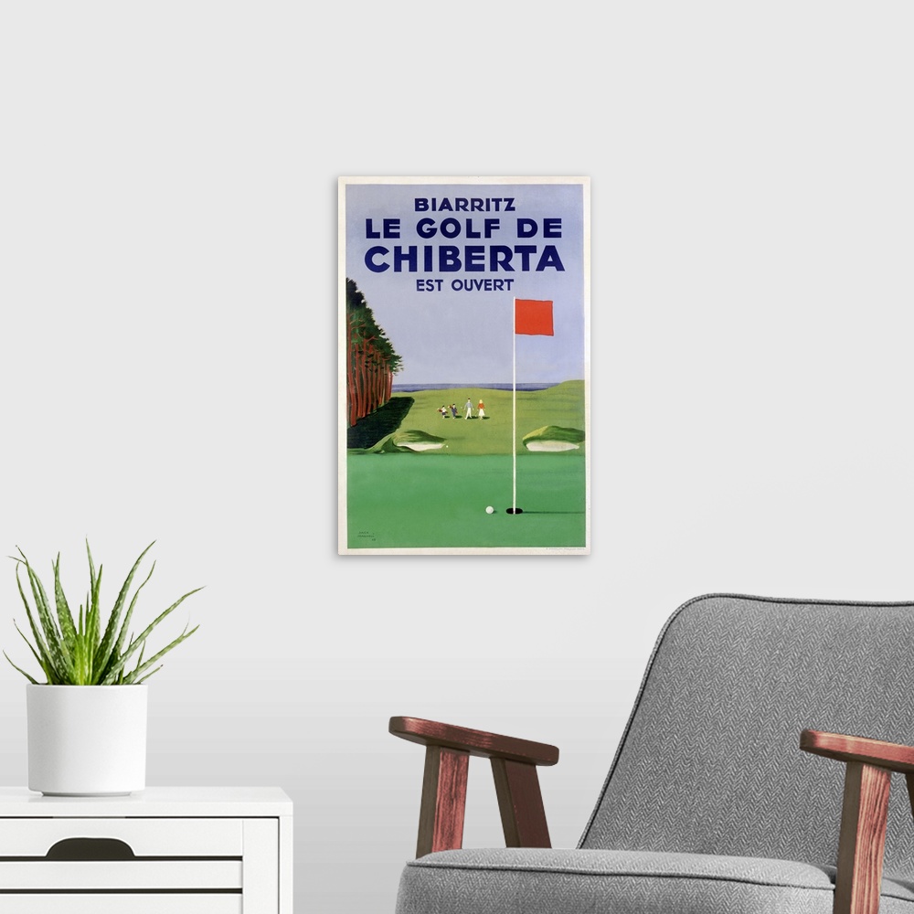 A modern room featuring This antique poster advertises scenic costal golf course; the art work has graphic qualities and ...