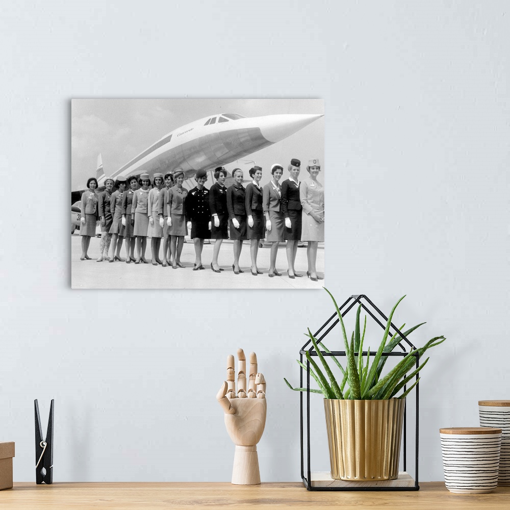 A bohemian room featuring A line-up of some of the air stewardesses who attend to passengers on board 'Concorde', each one ...