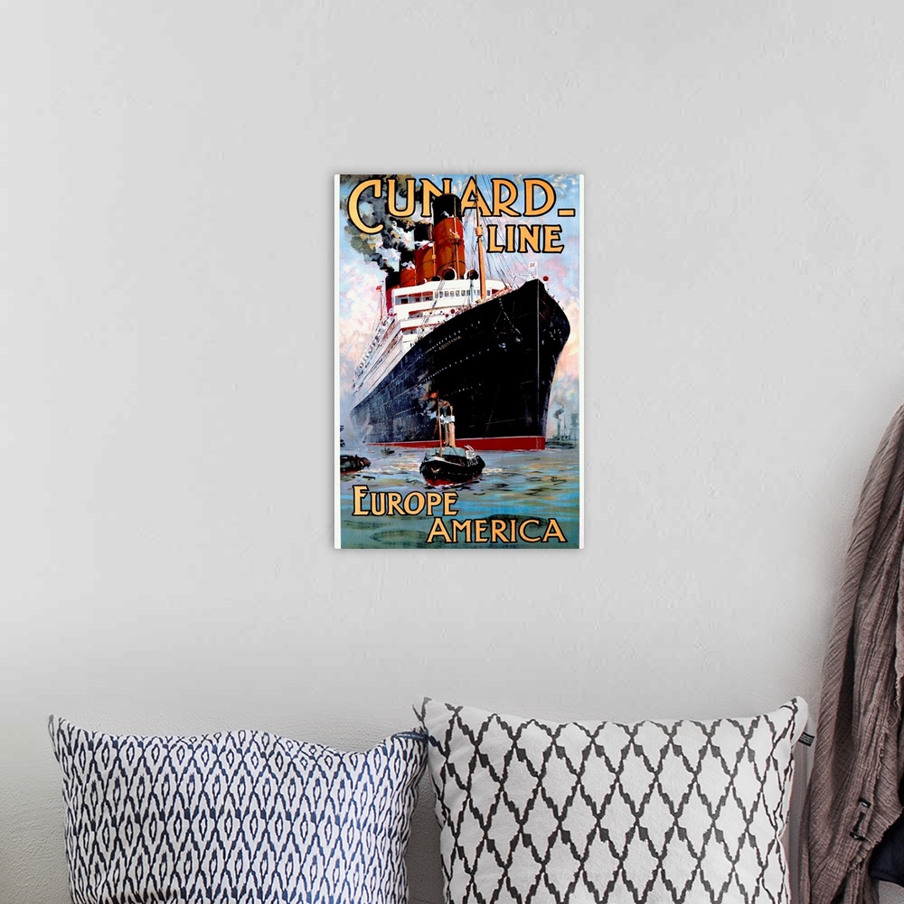 A bohemian room featuring Vintage poster of an immense passenger ship that is being pulled by a small tug boat at the botto...