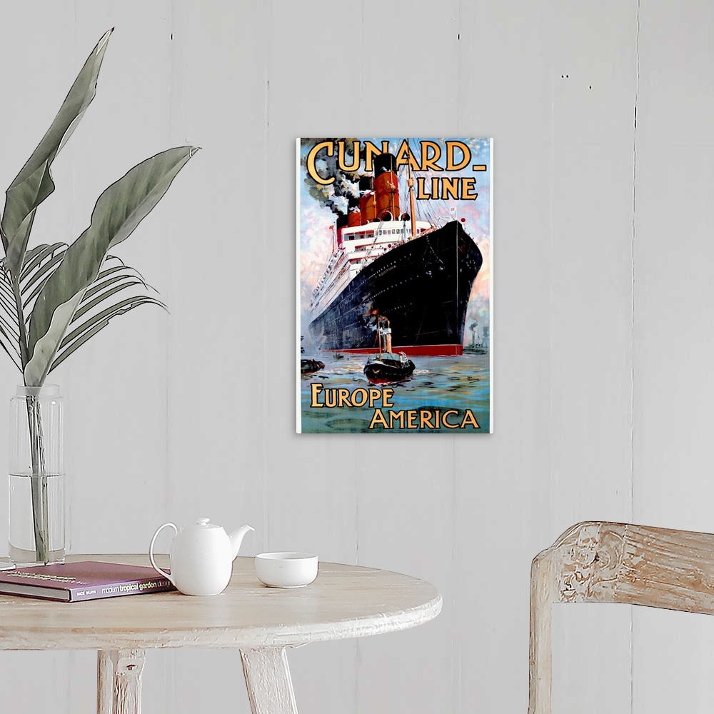 A farmhouse room featuring Vintage poster of an immense passenger ship that is being pulled by a small tug boat at the botto...
