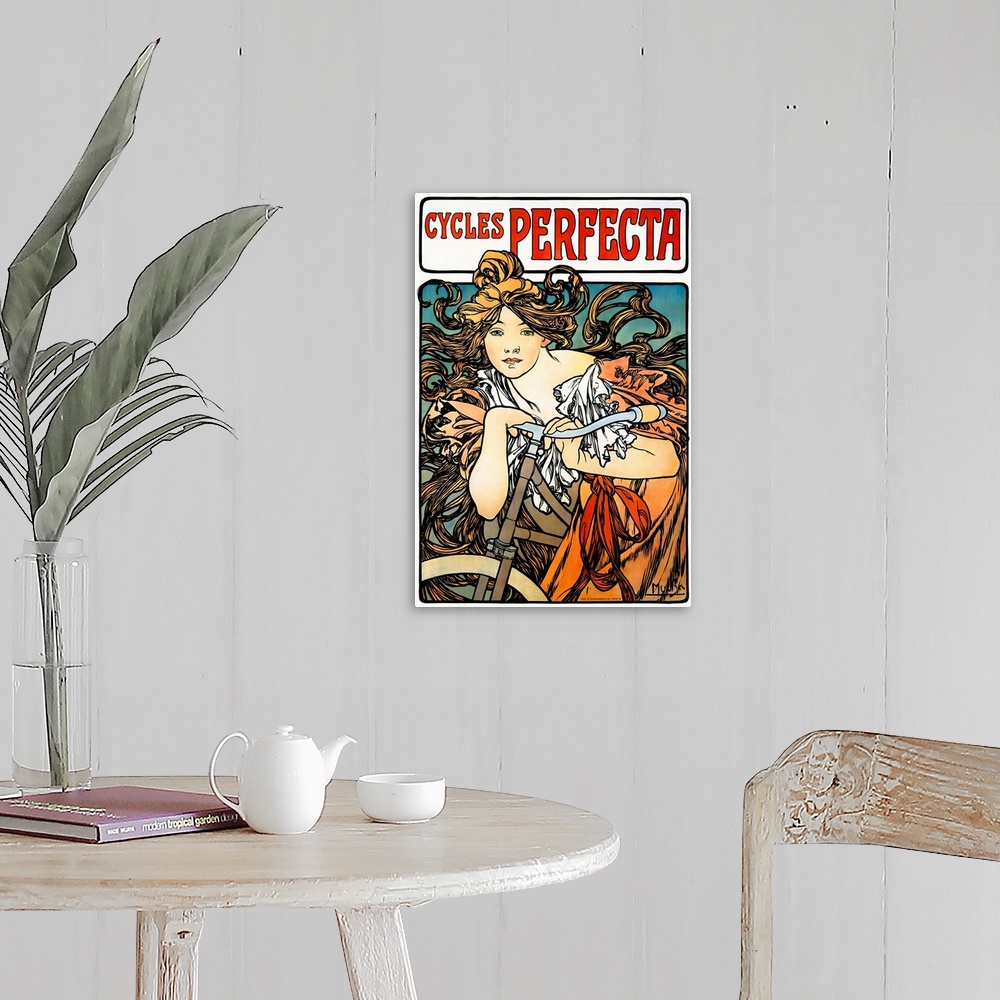 A farmhouse room featuring Art Nouveau poster of a beautiful female figure draped over a bicycle with flowing hair.