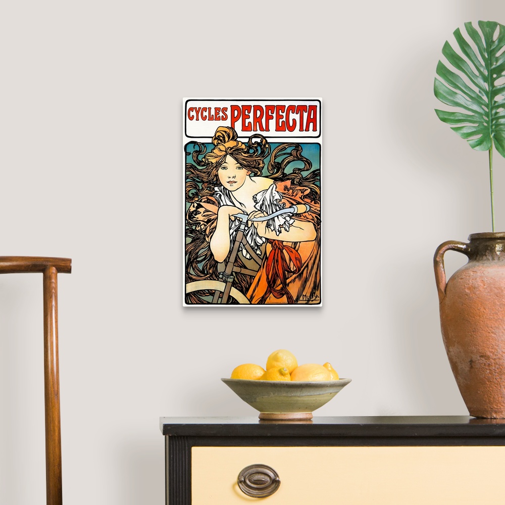 A traditional room featuring Art Nouveau poster of a beautiful female figure draped over a bicycle with flowing hair.