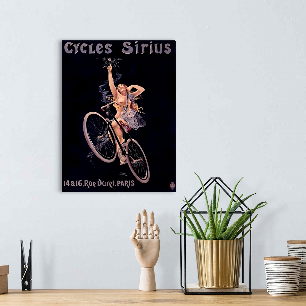 A bohemian room featuring Vintage poster of a woman on a bicycle reaching up to touch a star with text written above and be...