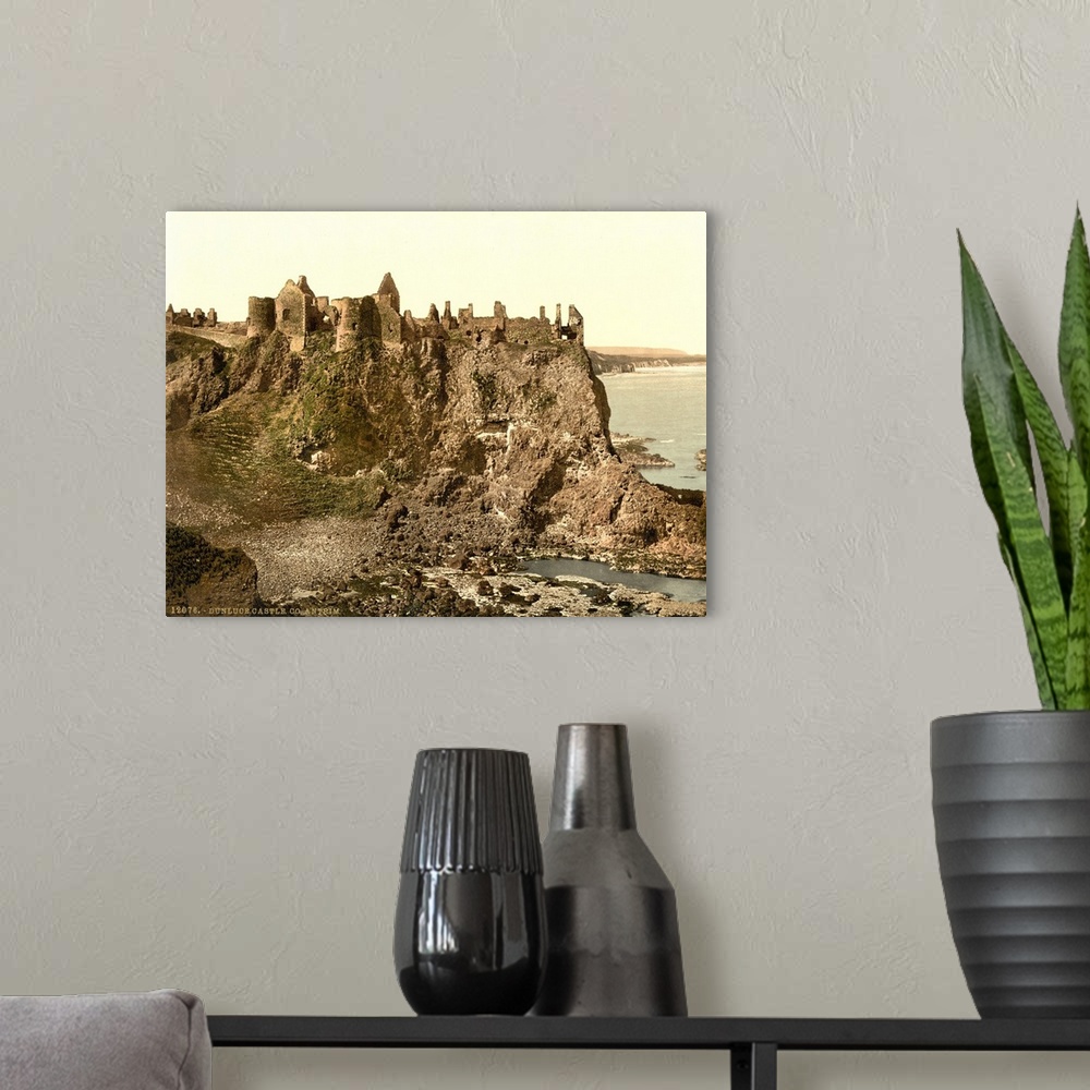A modern room featuring Hand colored photograph of Dunluce castle, country Antrim, Ireland.
