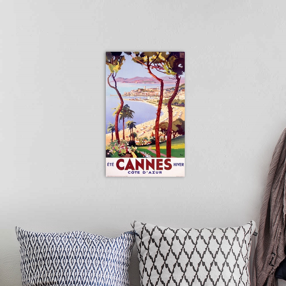 A bohemian room featuring Classic travel advertisement for the Cote d'Azur often known in English as the French Riviera.