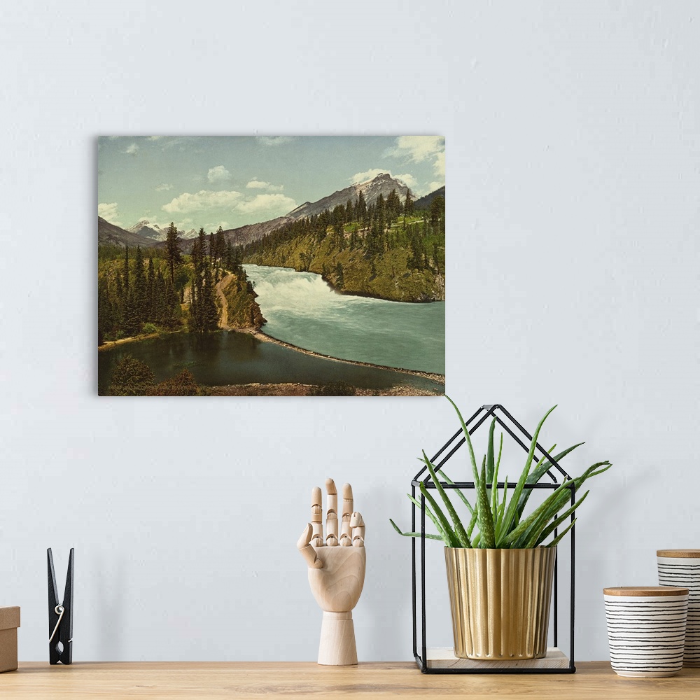 A bohemian room featuring Hand colored photograph of falls of the bow river, Banff, Alberta.
