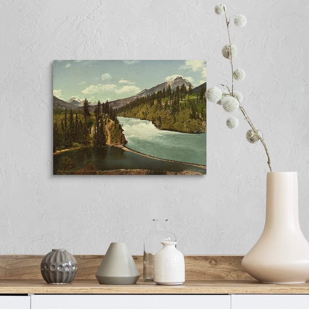 A farmhouse room featuring Hand colored photograph of falls of the bow river, Banff, Alberta.