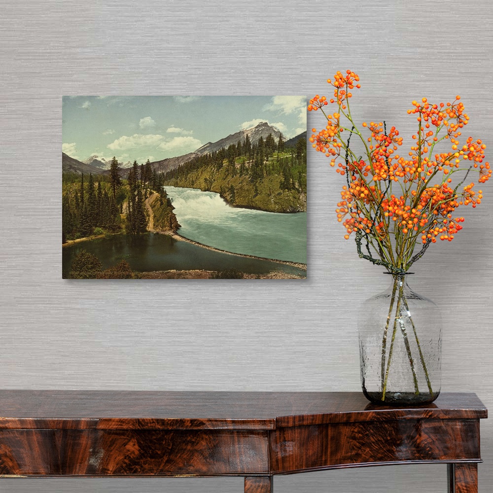 A traditional room featuring Hand colored photograph of falls of the bow river, Banff, Alberta.