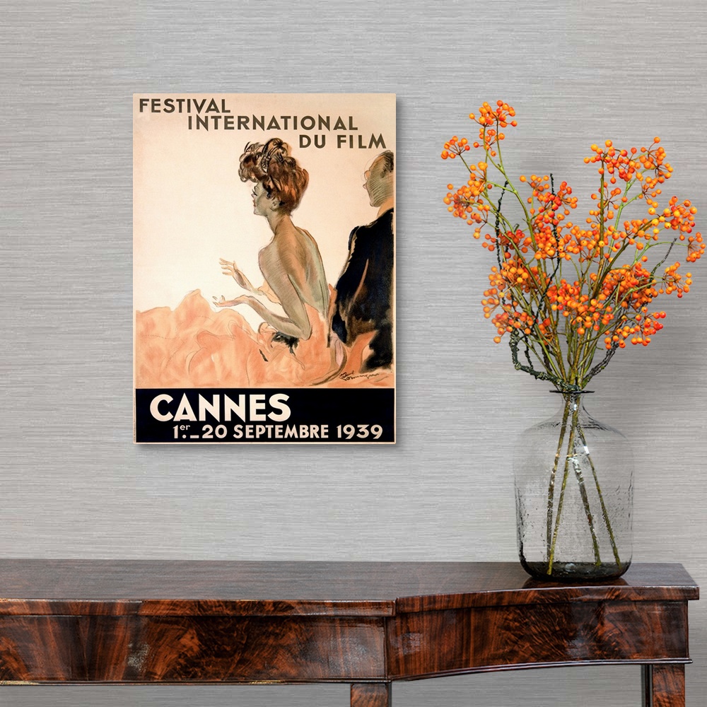 A traditional room featuring Vintage advertising poster from 1939 showing a woman in a gown and a man in a tuxedo watching a f...