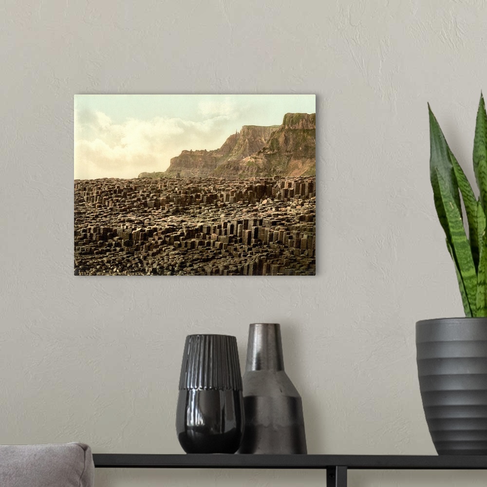 A modern room featuring Hand colored photograph of giant's causeway, country Antrim, Ireland.
