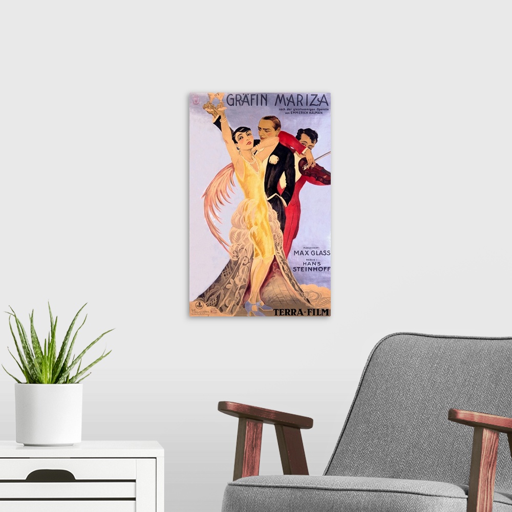 A modern room featuring Old entertainment advertising print.  A man and woman dressed in vintage formal wear are holding ...
