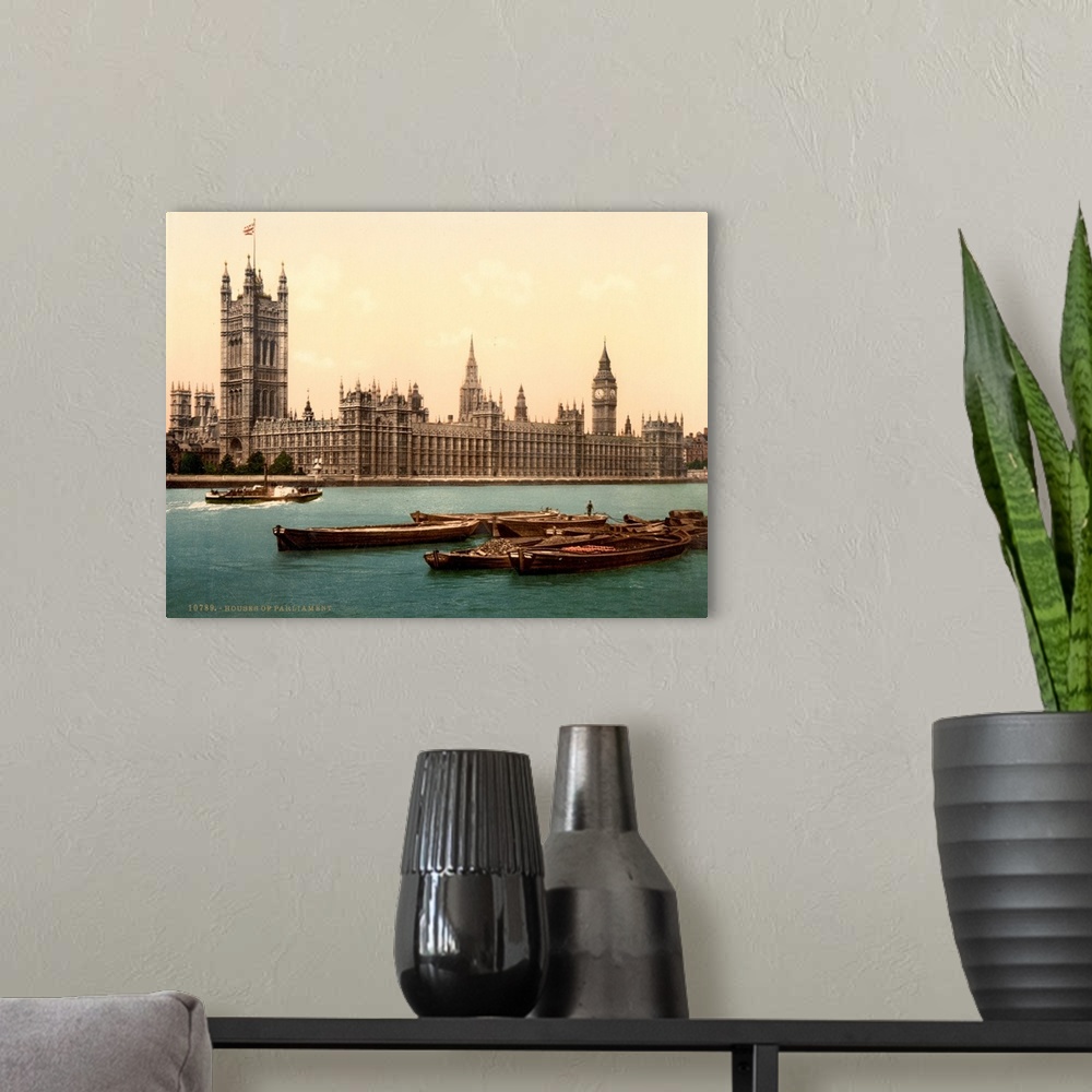 A modern room featuring Hand colored photograph of house of parliament London, England.