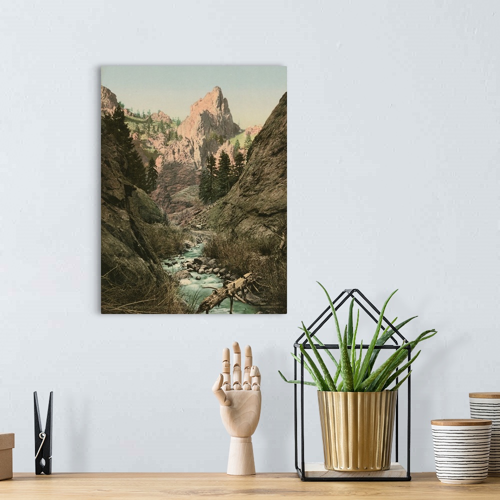 A bohemian room featuring Hand colored photograph of in south Cheyenne canyon, Colorado.