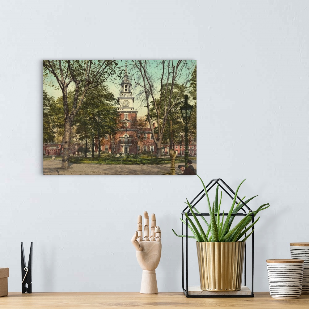 A bohemian room featuring Hand colored photograph of independence hall, Philadelphia.