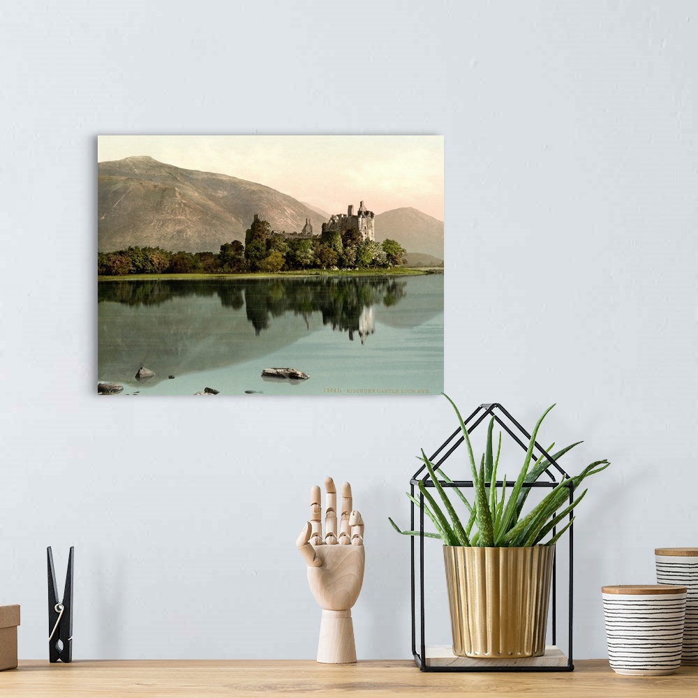 A bohemian room featuring Hand colored photograph of Kilchurn castle, loch awe, Scotland.