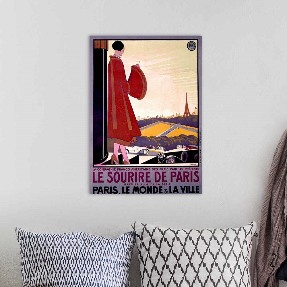 A bohemian room featuring Big, vertical, vintage advertisement for the French film Le Sourire de Paris, a woman in an extra...